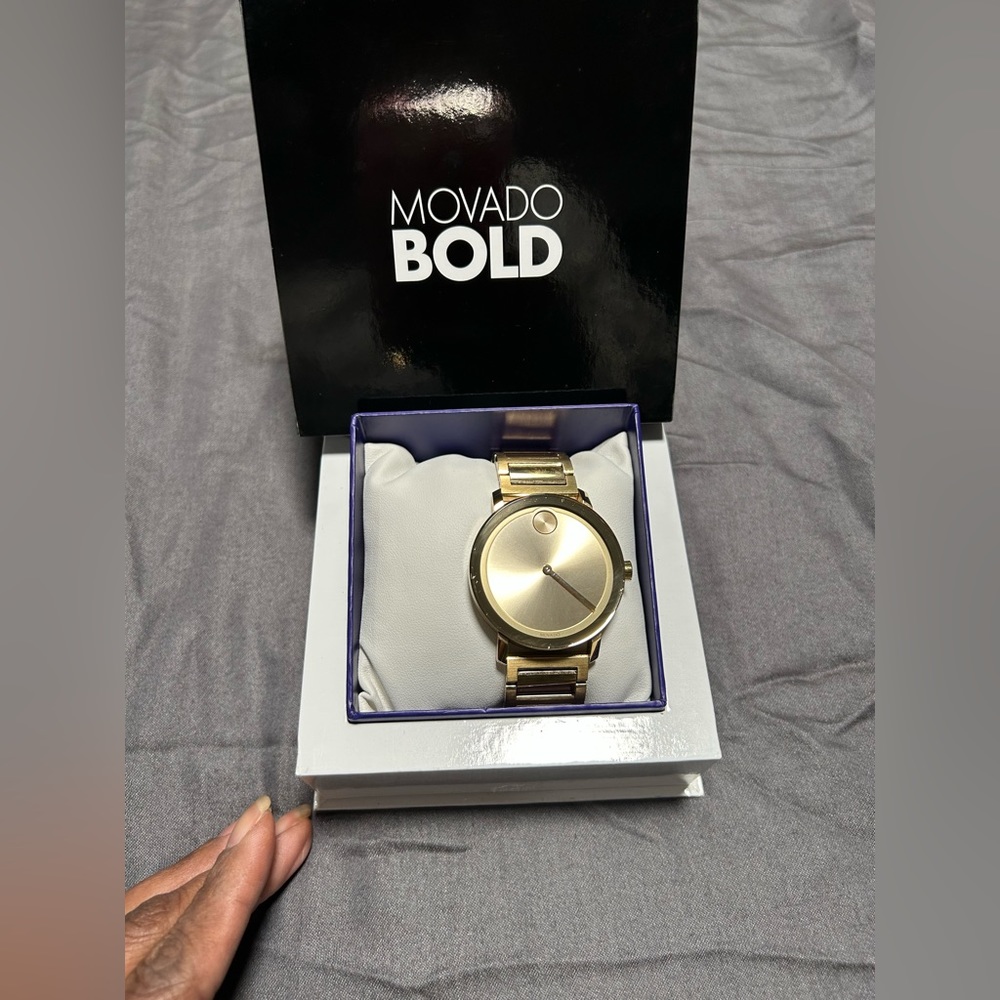 Movado watch for men gold nearly new in very good condition